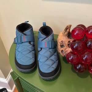 Chaco blue puff quilted snow shoes.